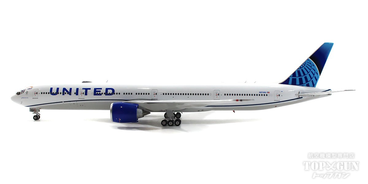 United new livery Boeing 777-300/ER N2749U with stand
