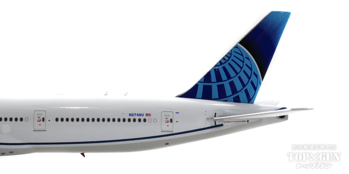 United new livery Boeing 777-300/ER N2749U with stand